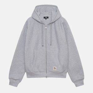 SUDADERA CON CREMALLERA Y ETIQUETA DE DOBLE CARA